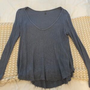 Thin distressed blue sweater